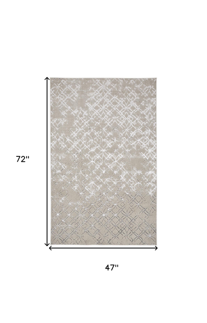4' X 6' Tan Silver And Gray Quatrefoil Area Rug