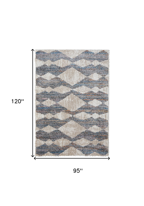 8' X 10' Tan Ivory And Blue Chevron Power Loom Stain Resistant Area Rug