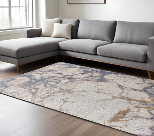 8' X 10' Tan Blue And Beige Abstract Distressed Area Rug