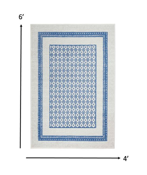 4' X 6' Ivory And Blue Geometric Area Rug Polypropylene Home Accent