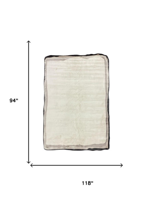 7' X 9' Black And Cream Area Rug