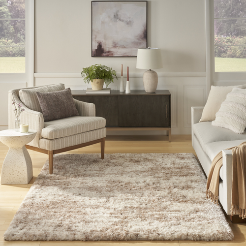 5' X 7' Beige and Ivory Abstract Shag Area Rug