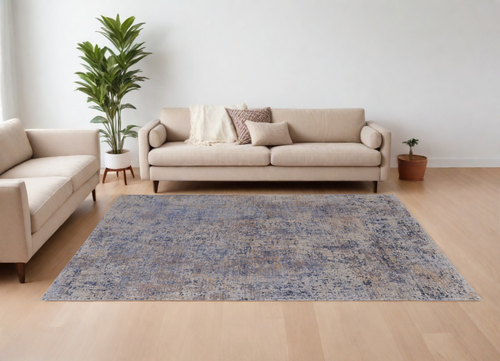 8' X 10' Blue Brown and Tan Abstract Power Loom Area Rug