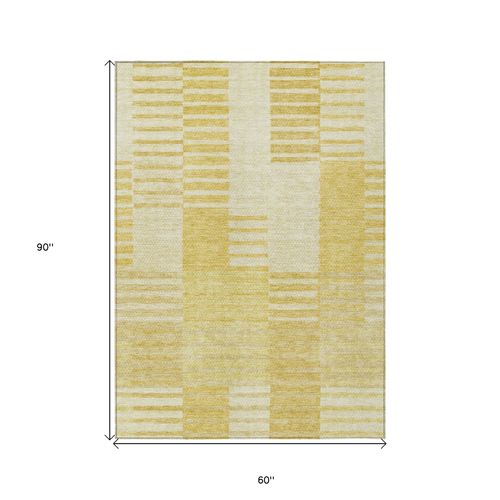 5' X 8' Gold Wheat And Ivory Striped Washable Indoor Outdoor Area Rug