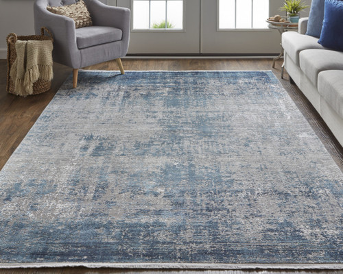 7' X 10' Blue and Gray Abstract Power Loom Distressed Area Rug With Fringe