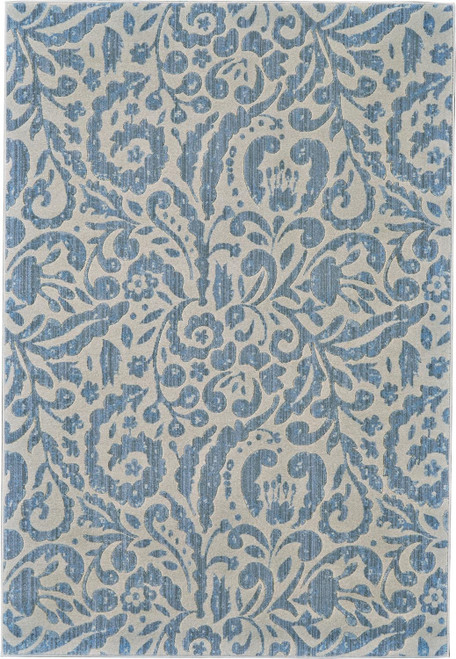 8' X 11' Blue Ivory And Tan Floral Distressed Stain Resistant Area Rug