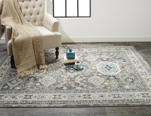 8' X 11' Gray Brown And Blue Floral Stain Resistant Area Rug