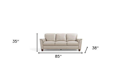 85" Beige Leather And Black Sofa