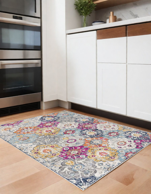 4' X 6' Blue and Ivory Floral Area Rug