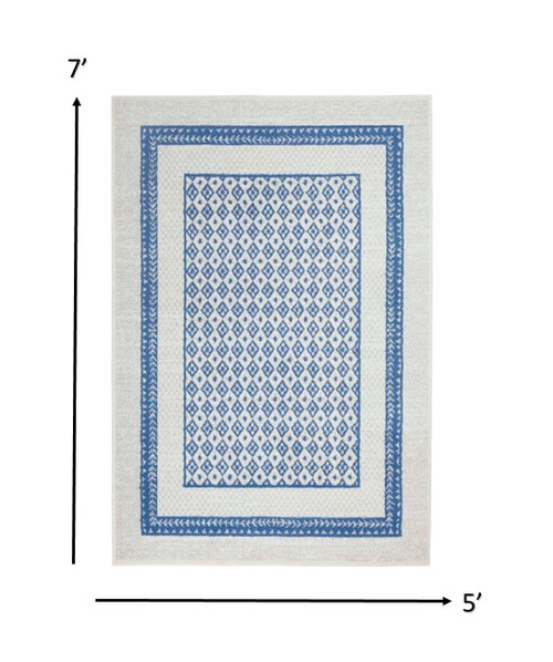 5' X 7' Ivory And Blue Geometric Area Rug Polypropylene Home Accent