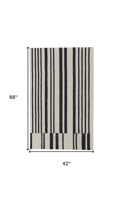 4' X 6' Ivory and Black Wool Abstract Hand Tufted Area Rug