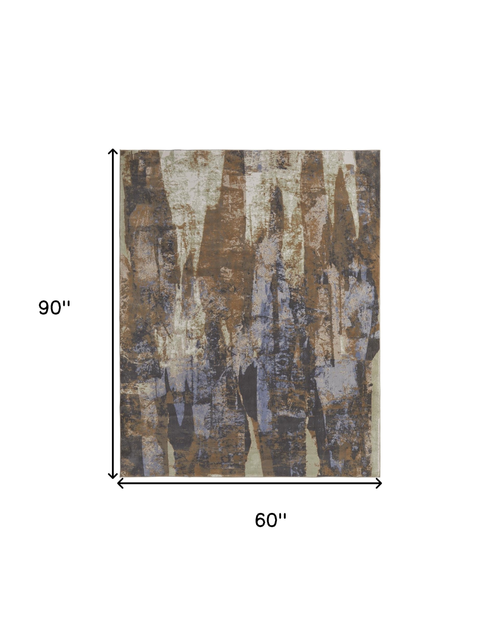 5' X 8' Brown Blue And Ivory Abstract Distressed Area Rug
