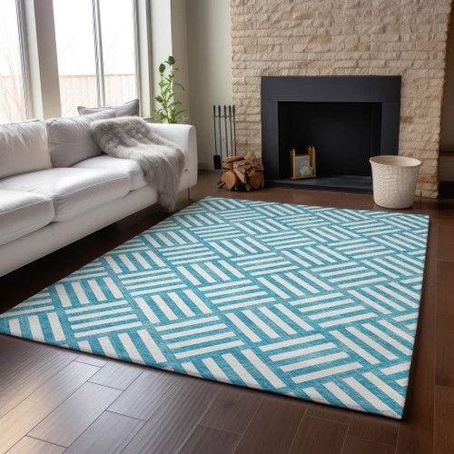 5' X 8' Teal And Ivory Geometric Washable Area Rug With UV Protection