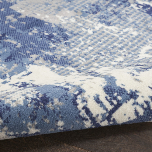 2' X 4' Blue And Ivory Abstract Area Rug