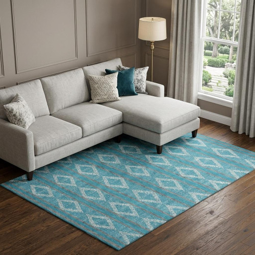10' X 14' Teal And Ivory Geometric Washable Area Rug With UV Protection