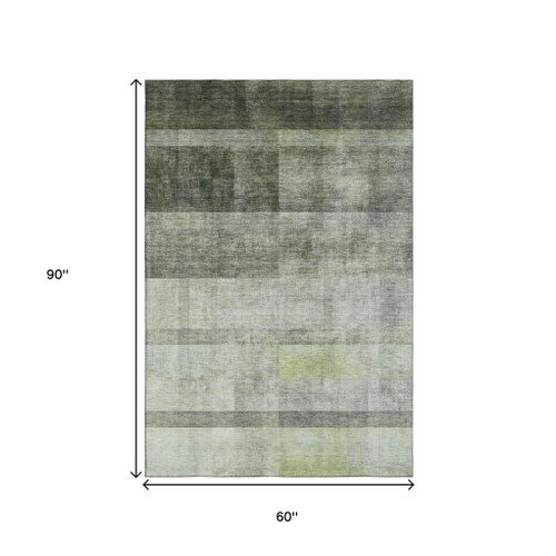 5' X 8' Olive Green And Ivory Abstract Washable Area Rug With UV Protection