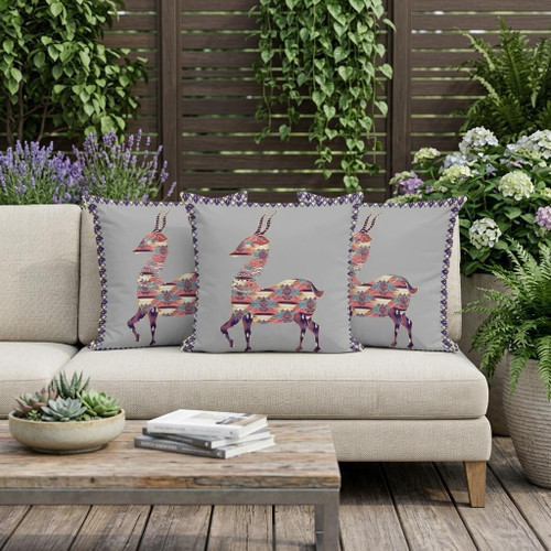 Set of Three Purple And Cream Deer Indoor Outdoor Throw Pillow