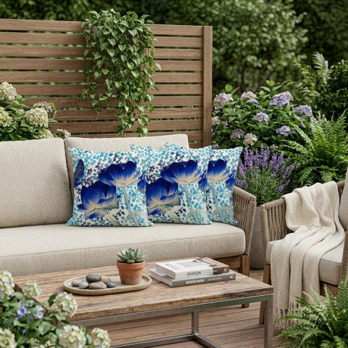 Set of Three Blue Cream And Off White Floral Indoor Outdoor Throw Pillow
