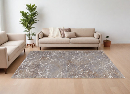 8' X 10' Ivory Brown and Taupe Abstract Power Loom Area Rug