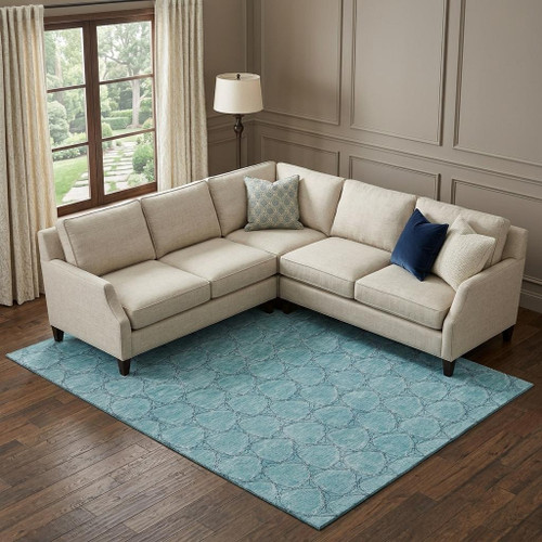 8' X 10' Teal And Ivory Geometric Washable Area Rug With UV Protection