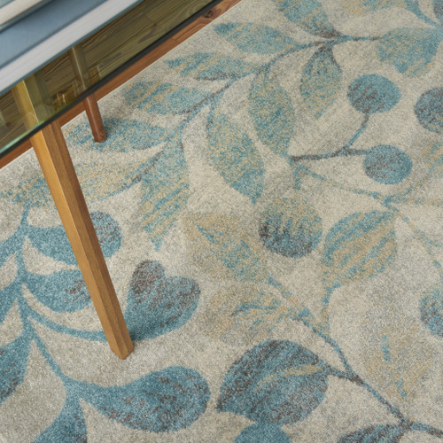 6' X 9' Ivory And Turquoise Botanical Leaves Area Rug