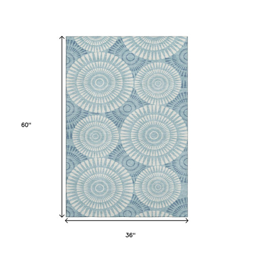 3' X 5' Teal And Ivory Geometric Washable Area Rug With UV Protection