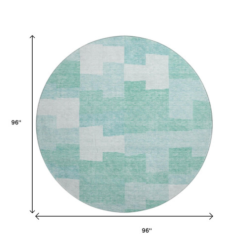 8' Teal And Ivory Geometric Washable Round Rug With UV Protection