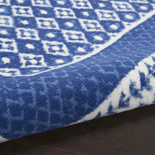 8' X 12' Blue And Ivory Geometric Distressed Area Rug