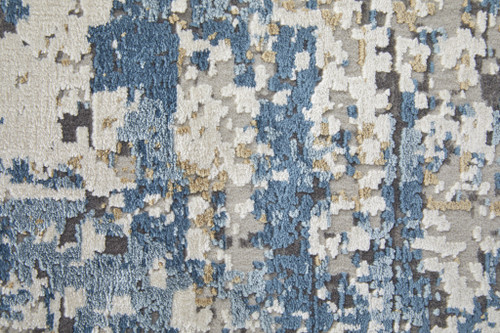 12' X 18' Ivory Tan and Blue Abstract Power Loom Area Rug With Fringe