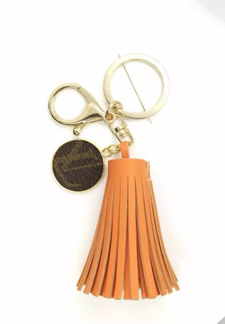 LV Again - Golden Orange Keychain Tassel With LV Charm