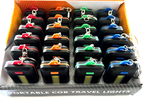 box of Portable Very Cool Travel LED Light Keychains