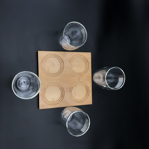 A Set of a 4 section Bamboo tray with 4 doublewalled thermo glasses to match