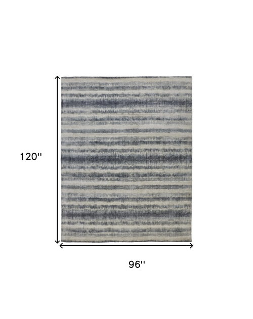 8' X 10' Ivory And Blue Abstract Hand Woven Area Rug