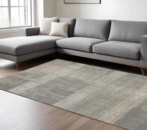 7' X 10' Ivory Brown And Gray Abstract Area Rug