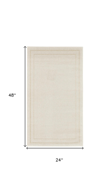 2' X 4' Ivory And Gold Indoor Outdoor Area Rug