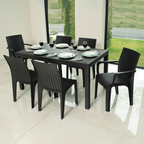 Seven Piece Brown Plastic Outdoor Patio Set With Table