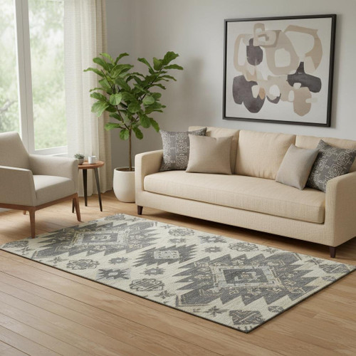 5' X 8' Beige Charcoal And Gray Tribal Washable Area Rug With UV Protection