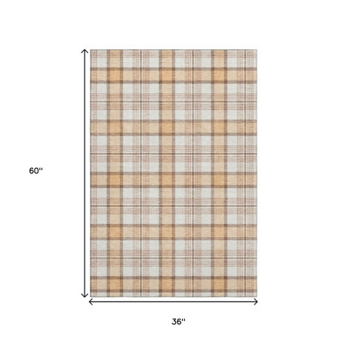 3' X 5' Peach Ivory And Brown Plaid Washable Area Rug With UV Protection