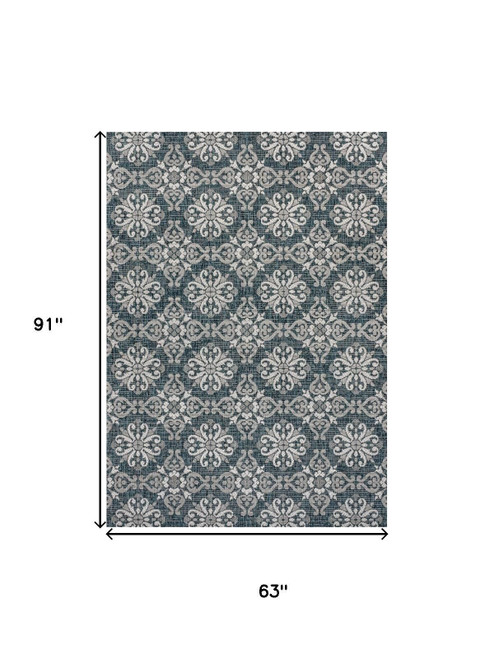 5' X 8' Turquoise And Cream Floral Indoor Outdoor Area Rug