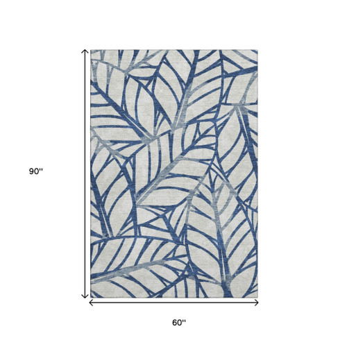 5' X 8' Navy Blue And Beige Floral Washable Area Rug With UV Protection