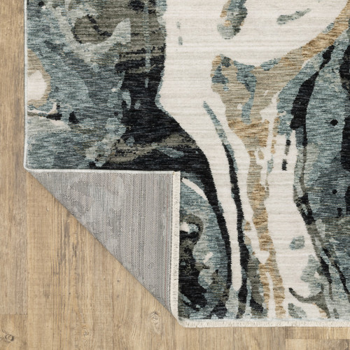 7' X 10' Blue Black And Ivory Abstract Area Rug With Fringe