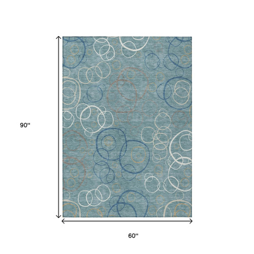 5' X 8' Teal Blue Beige And Ivory Geometric Washable Indoor Outdoor Area Rug