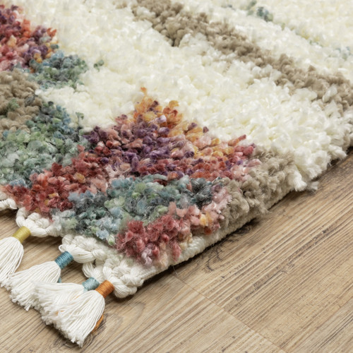 8' X 11' Tan Gray And Ivory Abstract Shag Distressed Area Rug With Fringe