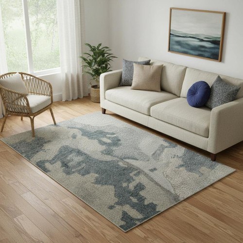 5' X 8' Blue And Ivory Abstract Hand Tufted Area Rug