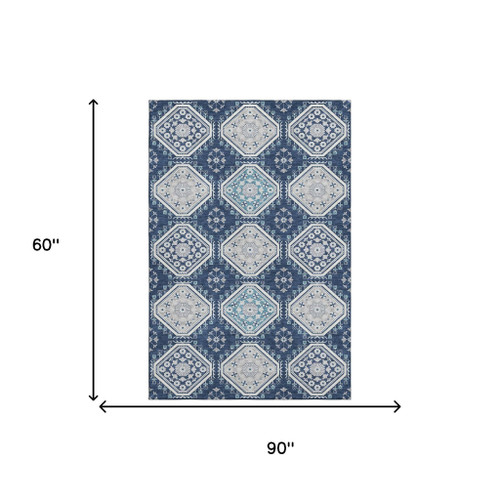 5' X 8' Navy Blue And Ivory Floral Washable Area Rug With UV Protection