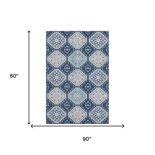 5' X 8' Navy Blue And Ivory Floral Washable Area Rug With UV Protection