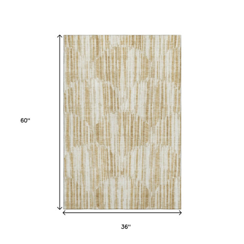 3' X 5' Gold Ivory And Beige Abstract Washable Area Rug With UV Protection