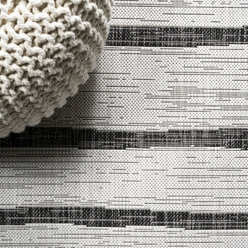 9' Ivory And Black Round Striped Indoor Outdoor Area Rug