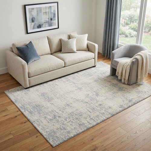 5' X 8' Ivory And Blue Abstract Area Rug
