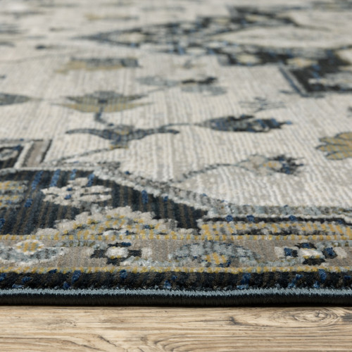 5' X 8' Blue Gray And Ivory Medallion Area Rug With Fringe